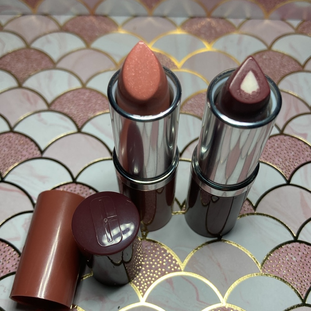 Two Clinique lipsticks